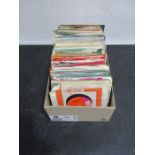 A collection of easy listening 7" vinyl singles including Fleetwood Mac, The Beatles, Tom Jones, Roy