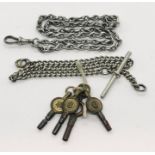 A hallmarked silver Albert, one other and four antique watch keys