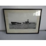 A framed photograph of a submarine (562)