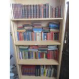 A large collection of various books - over four shelves