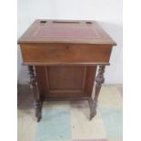 A Victorian mahogany Davenport- 1 castor missing- key in office