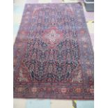 A blue ground Eastern rug