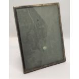 A hallmarked silver photo frame, 23cm x 18cm