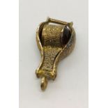 A gilt fob "magnifying glass"