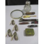 A collection of various items including Japanese brass pill box, bosuns whistle, pen knives,