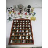A collection of thimbles, Russian miniature figures, dressing table pot etc.