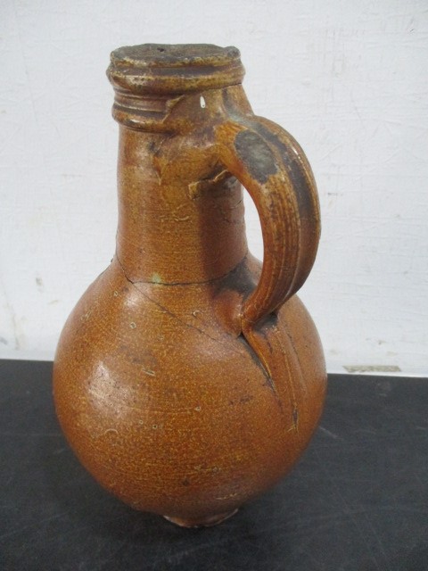 A 17th/18th century Bellarmine jug with bearded mask over armorial- neck repaired- approx 23cm - Image 6 of 15