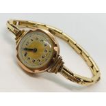 A Victorian 9ct gold ladies watch with an expandable strap