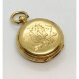 An 18ct gold compass fob
