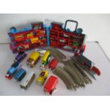 A Thomas & Friends "Ride The Rails" starter set, along with a Thomas The Tank Engine carry case full