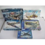 A collection of three boxed Italeri model aircrafts, including a Hurricane MK 1 and Stirling MK 1,
