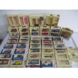 A collection of boxed Lledo Days Gone die-cast vehicles, along with a selection of empty Days Gone