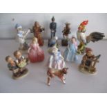 A collection of figurines including Royal Doulton, Goebels Adderley budgerigar etc