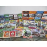 A collection of railway related DVDs, videos, magazines, collectors plates etc