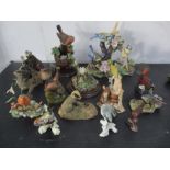 A collection of animal figures including Karl Ens, Broder fine art, Country artists, Aynsley etc.