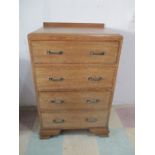 A small oak chest of four drawers