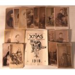 A small collection of cabinet photographs along with a 1918 christmas card from 144th siege
