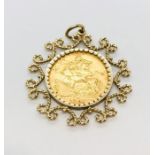 A 1901 full sovereign mounted in an ornate gold pendant mount - total weight 11.8g