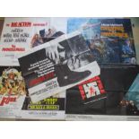 A collection of British quad film posters including Caravan to Vaccares, The Professionals, The