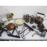 A collection of metal items including copperware, vintage kitchen scales with weights, wall brackets