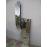 Two contemporary decorative wall mirrors