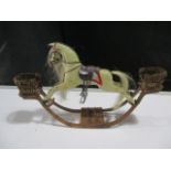 An antique style dolls house dapple grey rocking horse with basket seats