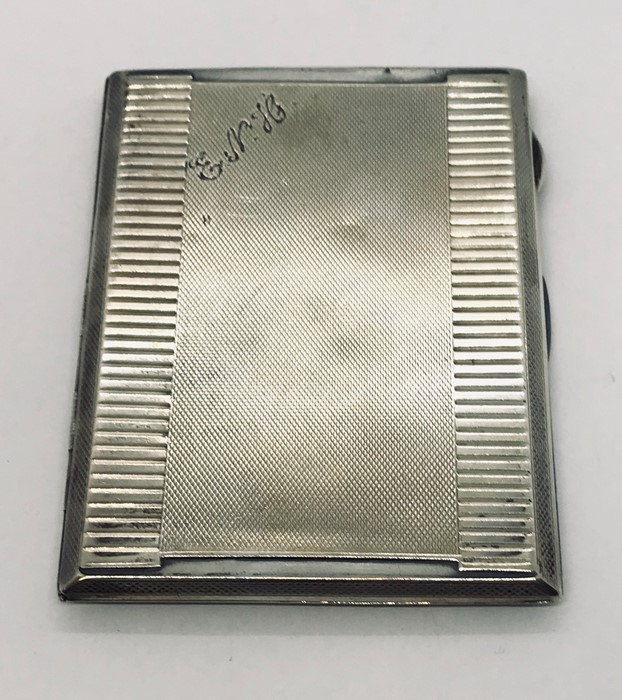 A hallmarked silver cigarette case. Weight 176g