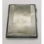 A hallmarked silver cigarette case. Weight 176g