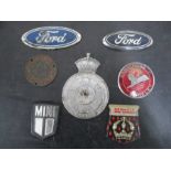 A collection of vintage car badges including an Edward VIII coronation, 1931, Armstrong Siddeley,