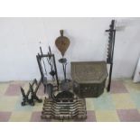 A collection of fire place related items including a fire grate, companion set, bellow, chimney