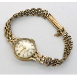A 9ct gold ladies Rotary wristwatch with 9ct gold strap - total weight including movement 14.2g