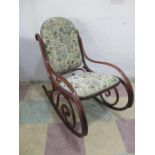 A vintage bentwood rocking chair