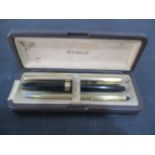 A Shaeffer fountain pen along with a Parker pen and one other