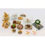 A collection of dolls house food items