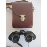 A pair of Carl Zeiss Jenoptem 8x30 binoculars in leather case