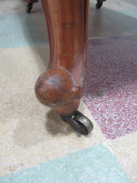 A Victorian walnut arm chair on brass castors - Image 6 of 7