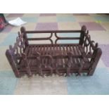 A cast iron fire basket