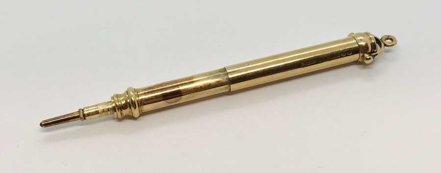 A 9ct gold propelling pencil, weight 13.6g