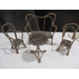 An antique dolls house set of bentwood table and chairs- some A/F
