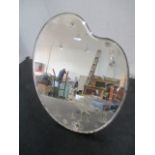 A dressing table mirror in the form of an artists pallette etched with a crane in river landscape,
