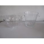 A glass ice bucket, along with a glass bowl.