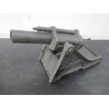 A English made model of an anti aircraft gun with height adjustable barrel and opening breech,
