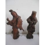 Two Chinese root carvings of a man and woman