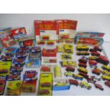 A collection of boxed and loose toy cars and vehicles on a Royal Mail theme, including Corgi,