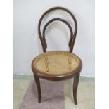 A children's Thonet bentwood chair with cane seating