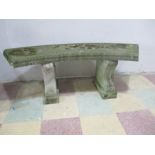 A garden stone curved bench.