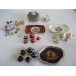 A collection of miniature tea sets along with a box of assorted costume jewellery