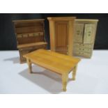 Four pieces of dolls house furniture- Pine dresser, linen press, pine corner cupboard and