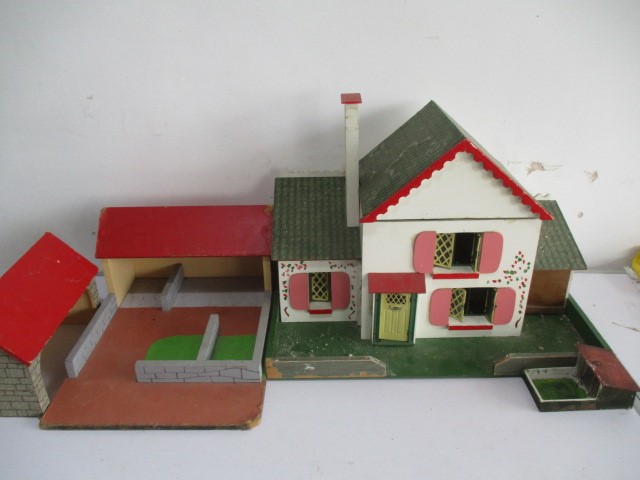 A "Jenlea" dolls house and similar stable block