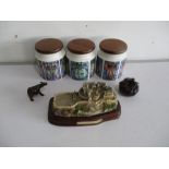 Three Renee Mackintosh inspired storage jars, along with a model of Edinburgh Castle, ceramic dog